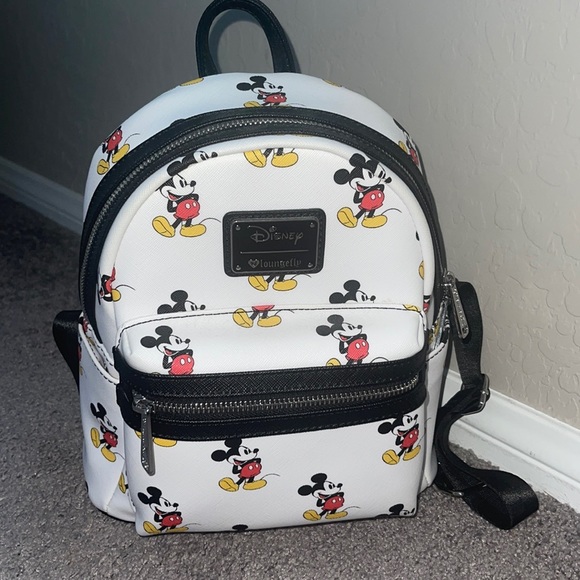 Got from Disneyland. Backpack is white with Mickey face. For men Woman and kids